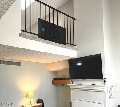 Vaulted living room a second floor loft which over