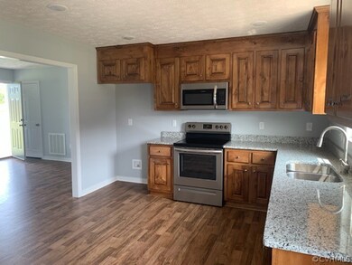 1074 Eubanks Rd, Dunnsville, VA 22454 - photo 4