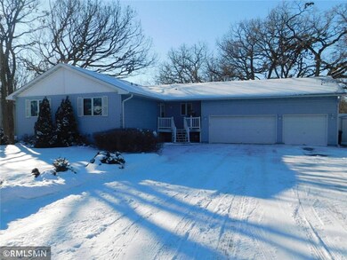 large 3 stall garage cement driveway
