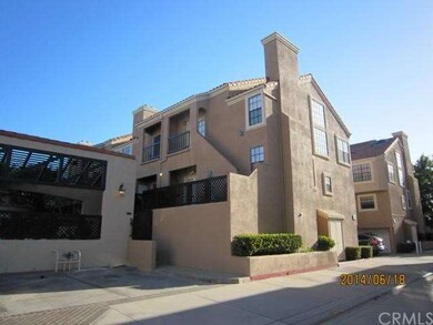 Back side view of unit, with balcony off master be