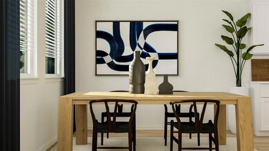 Dining space with light wood-type flooring