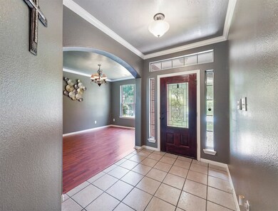 Foyer looking at the mahogany door w/glass inlay