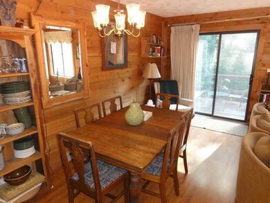 Dining Room. Sliders lead out to an upper deck