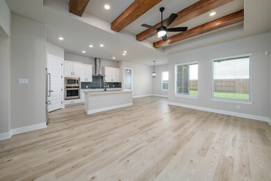 Bathed in natural light from expansive windows or