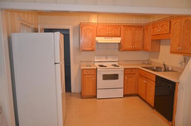 Furnished with a stove, refrigerator, and dishwasher