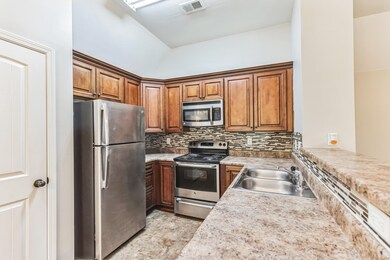 Kitchen with stainless steel appliances, decorativ