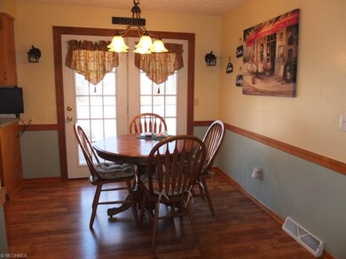 Dinette leads out to large deck.