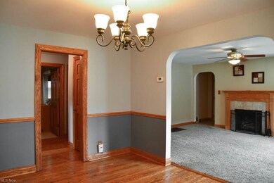 Dining room with wood flooring.