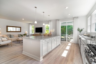 Kitchen featuring stainless steel gas stove, open 