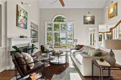 Great room. Fireplace, builtins, art lighting.