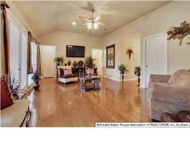 Spacious Living Room with Beautiful Wood Floors