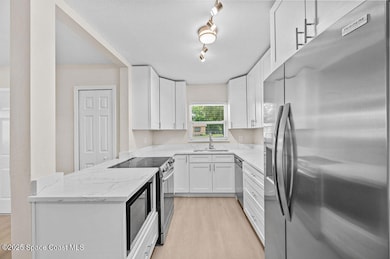 2413 Cherbourg Rd, Cocoa, FL 32926 - photo 6