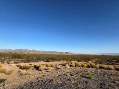 View of lot and mountain backdrop