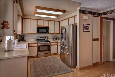 Convenient kitchen is open to the breakfast nook e