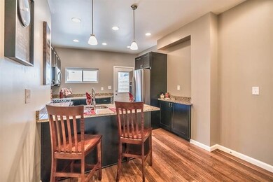 Notice the extra cabinet space beside the refriger
