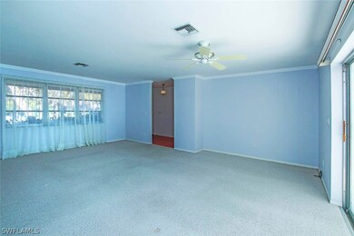 Living room to front entry