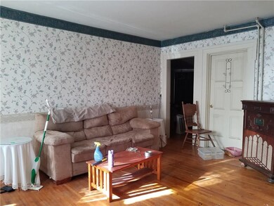 Very spacious living room with beautiful hardwood 