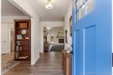 Luxury vinyl plank flooring throughout.