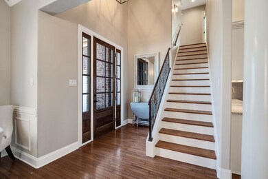 New Lighting in Entry & Sconce up the Stairs.