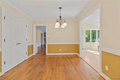 Hardwood floored spare room with lofted ceiling, o