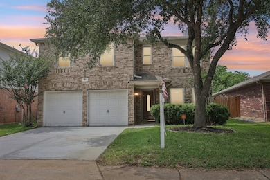This inviting two-story brick home is Ideal for bu