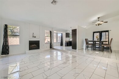 Living Room with views of Kitchen & Formal Dining