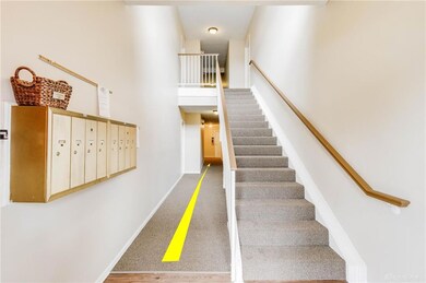 No steps, hallway straight back to first floor con