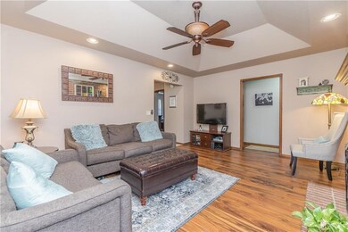 Living with wood floor and wood burning fireplace