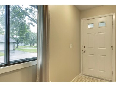 Spacious entry way with bright light and closet!