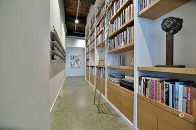 Main hallway with bookshelves