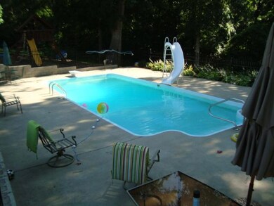 Inground pool with extra concrete