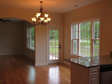 Open Dining Area w/Door to Covered Porch