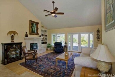 LIVING ROOM WITH BAMBO WOOD FLOORING, FRENCH DOORS