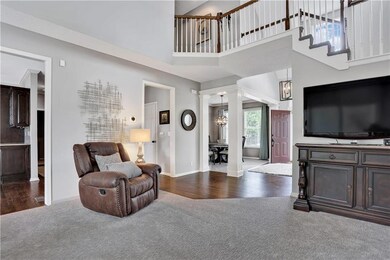View into the great room into the dining room and 