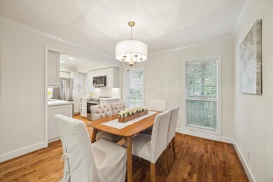 The dining room seamlessly connects with the livin