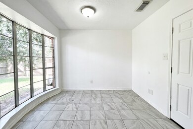 Breakfast area with bay window.