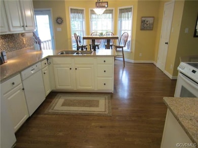 Kitchen Features an Eat-In Area with Bay Window ov