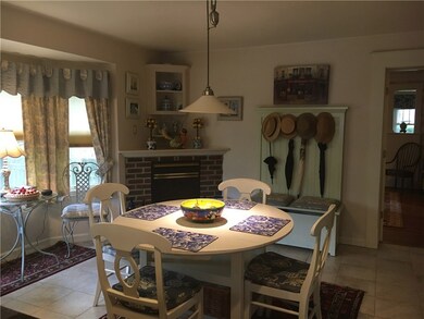 The eating area of the kitchen complete with Firep
