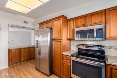 10749 WEST ABBOTT AVENUE