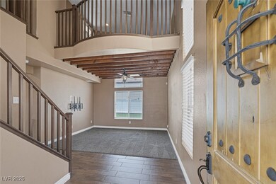 Living Room view from the Entryway featuring a cei