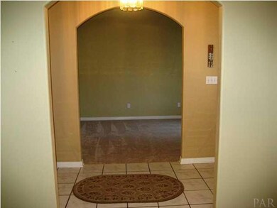 LOOKING INTO LIVING ROOM FROM DINING