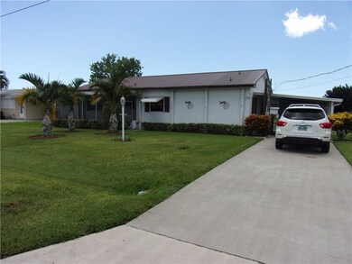 FRONT DRIVEWAY & CARPORT