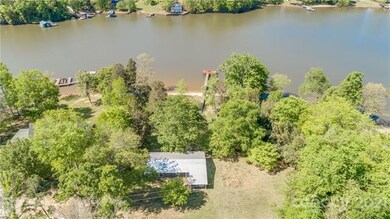 Aerial view of the home buffered by gorgeous matur