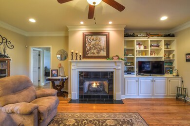 Imagine curling up with your favorite book around the fireplace or sprawling on the floor with the kids toys!