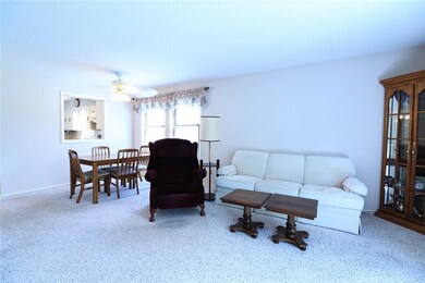 The oversized living room also offers additional eating space.