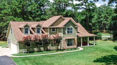 ENJOY that coffee in the morning, or that cold beverage in the evening! This front porch is a place for relaxing anytime day or night! The porch is approximately 24'x7'. Also look at the 2 car attached side entry garage, with plenty of concrete area for parking.