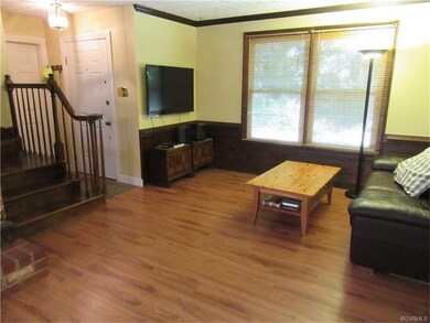 The Open Living Room is accentuated with New Wood 