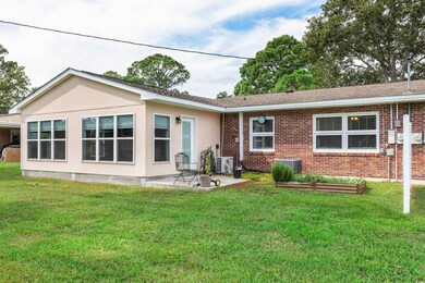 Rear view of house featuring central AC, a patio a