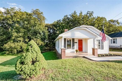Lots of open space to the left of the house