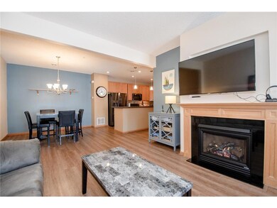 Warm and welcoming living room with gas fireplace.
